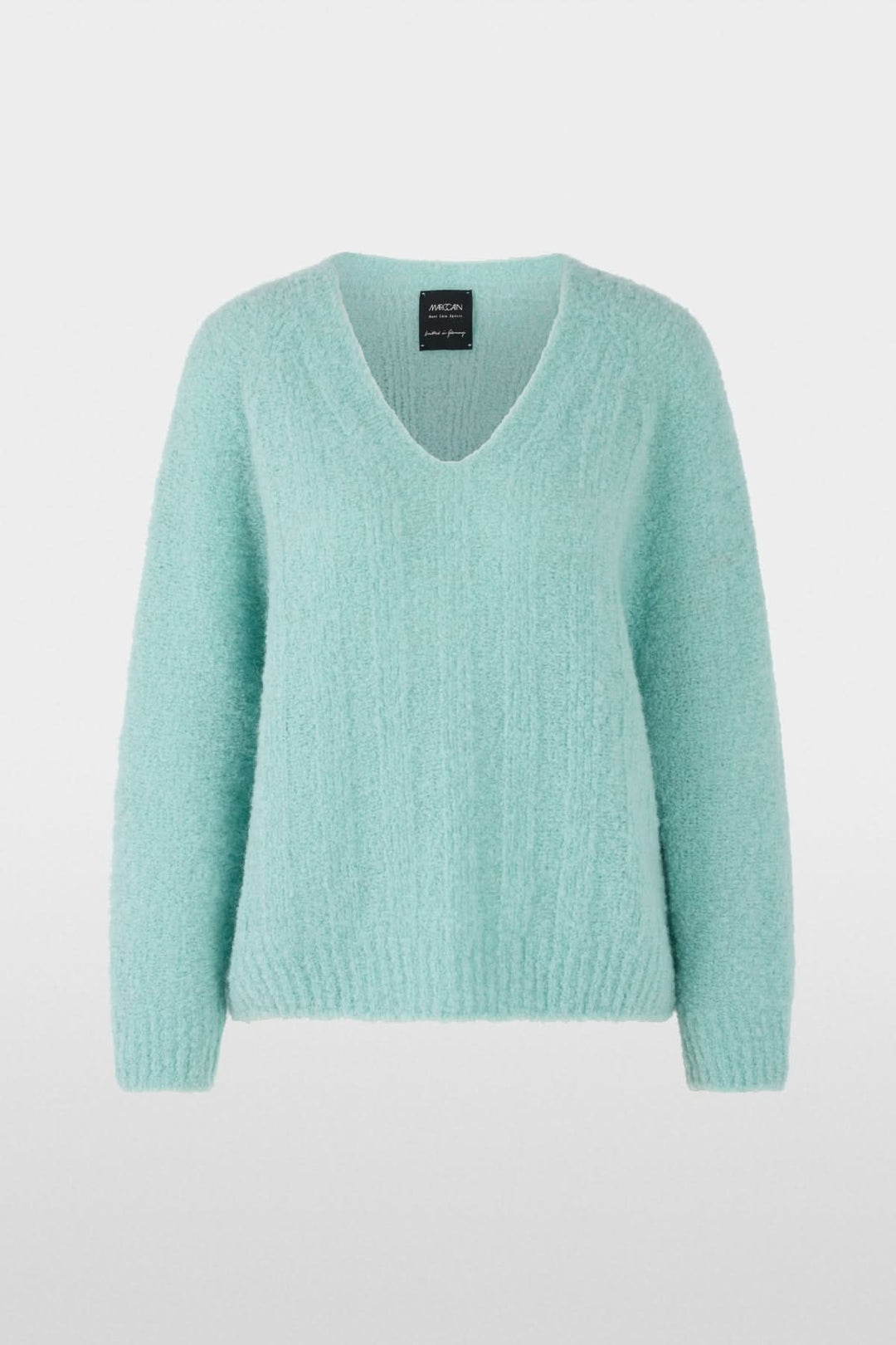 Chandail tricoté à col en V doux et duveteux en maille texturée pour un look cosy, idéal pour la mi-saison et l'hiver.