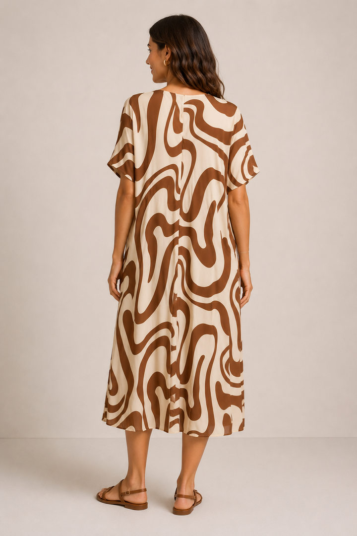 Flowing midi dress with an abstract pattern
