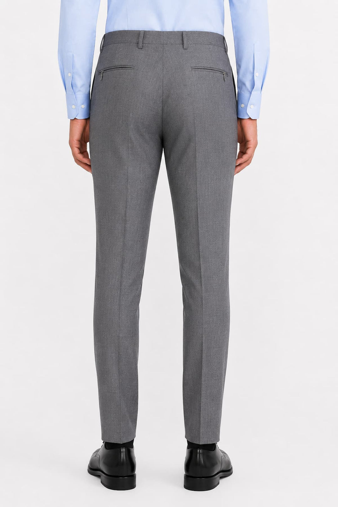 Vue de côté pantalon habillé en laine gris Corneliani pour homme avec plis élégants - Valérie Simon