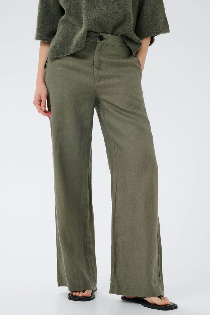 Pantalon de lin Solina, taille haute, style décontracté avec jambes larges et poches, couleur vert olive.