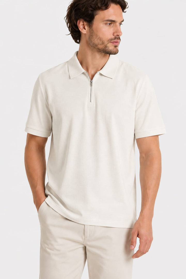 Vue de face polo à demi-glissière Fradi pour homme vert avec logo discret - Valérie Simon