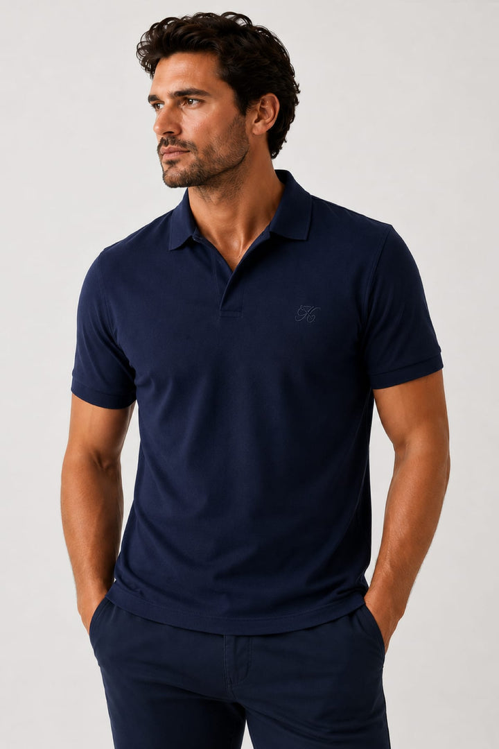 Vue de face polo extensible de Lief Horsens pour homme bleu avec col boutonné - Valérie Simon
