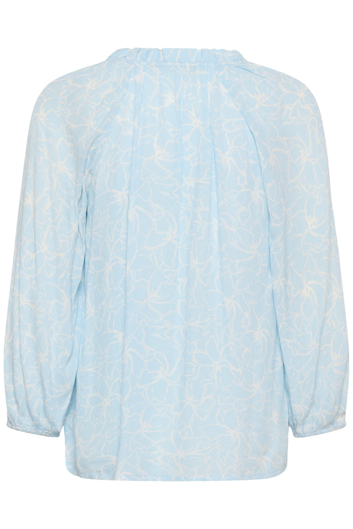 Blouse fluide à imprimé floral discret