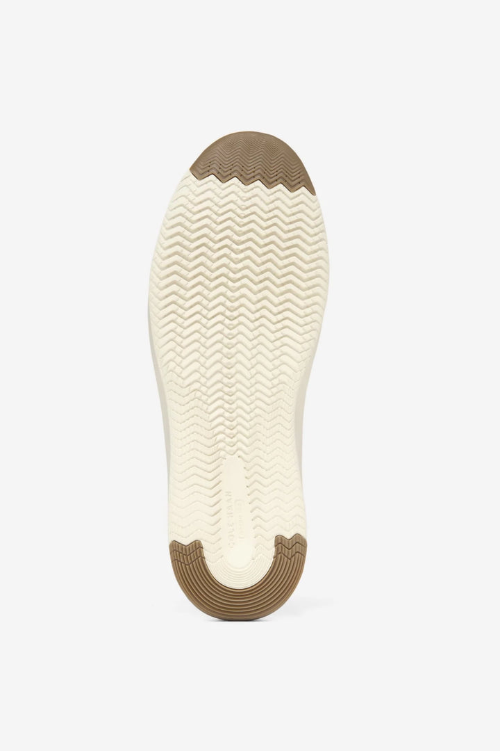 Sneakers en cuir à semelle contrastante vue de côté pour homme Cole Haan