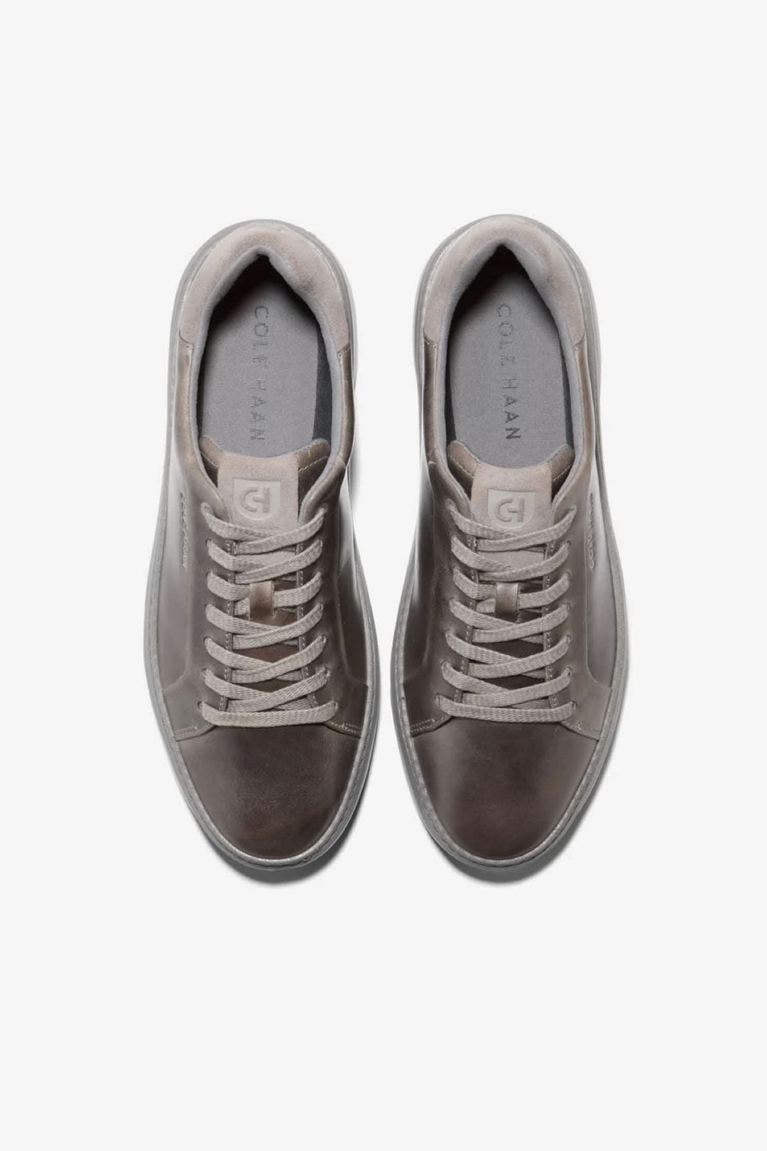 Sneakers en cuir blanches à semelle plateforme vue de côté pour homme Cole Haan