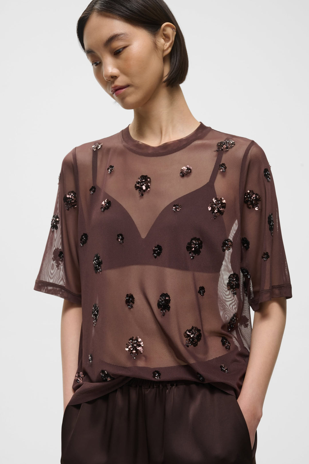 Women’s black Bami T-shirt in sheer tulle with floral sequins, front view Inwear
