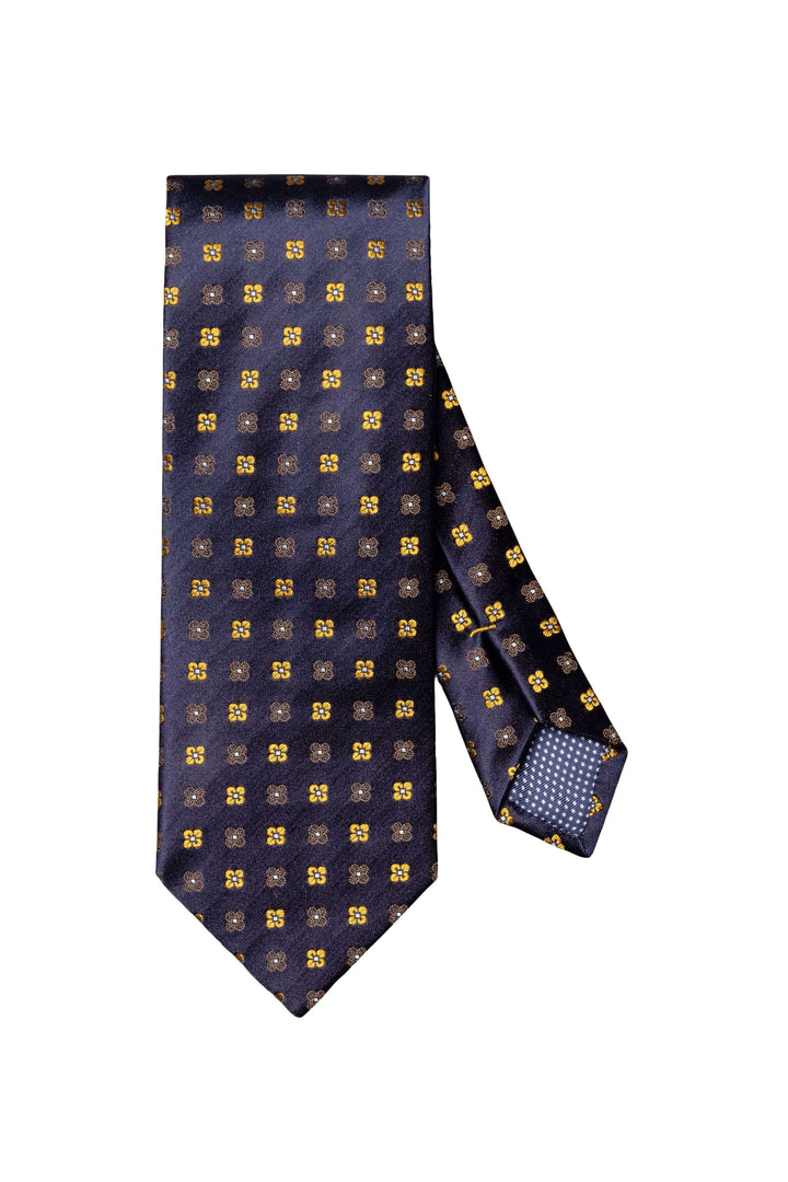 Cravate à motifs floraux géométriques, élégante, fond foncé avec motifs dorés, finition lisse et brillante.
