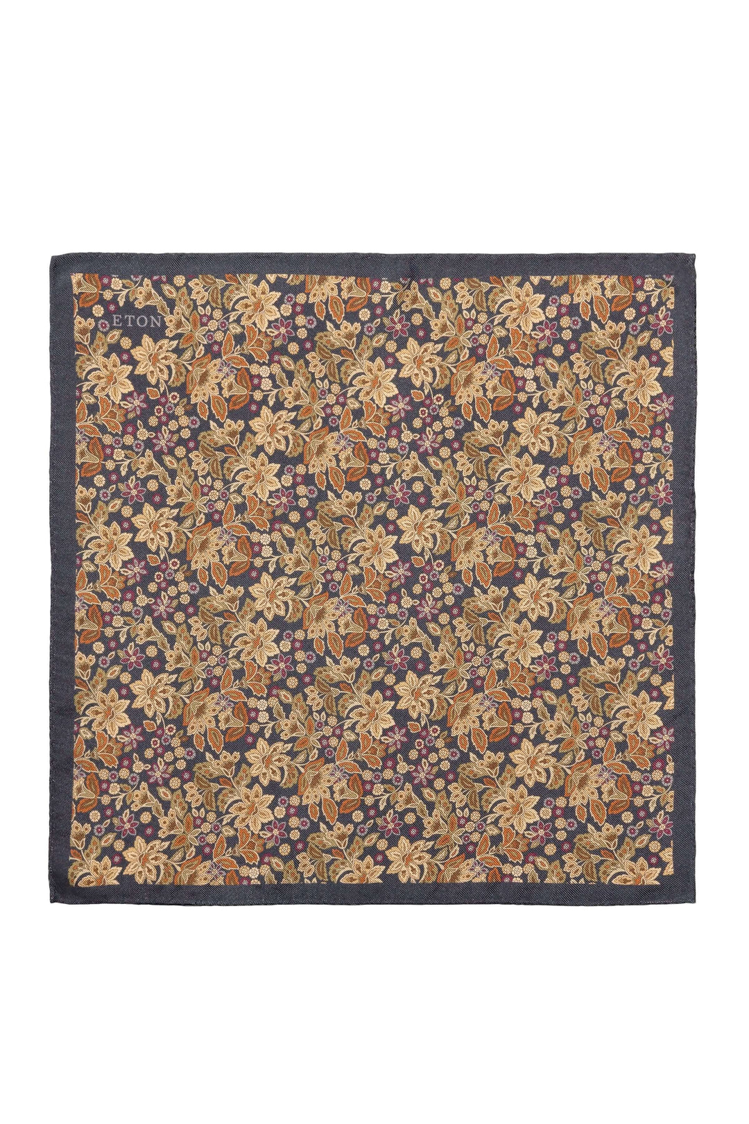 Foulard de poche en soie à motif floral riche et élégant, idéal pour un look sophistiqué.