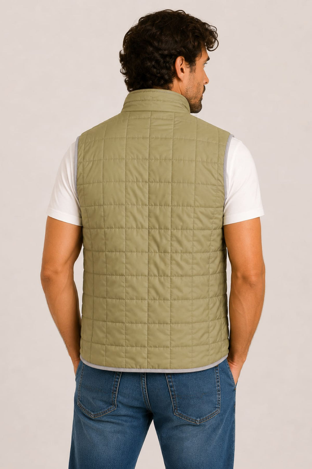 Front view of the sleeveless jacket Waterville for men in beige with a stand-up collar and quilted detailing - Valérie Simon